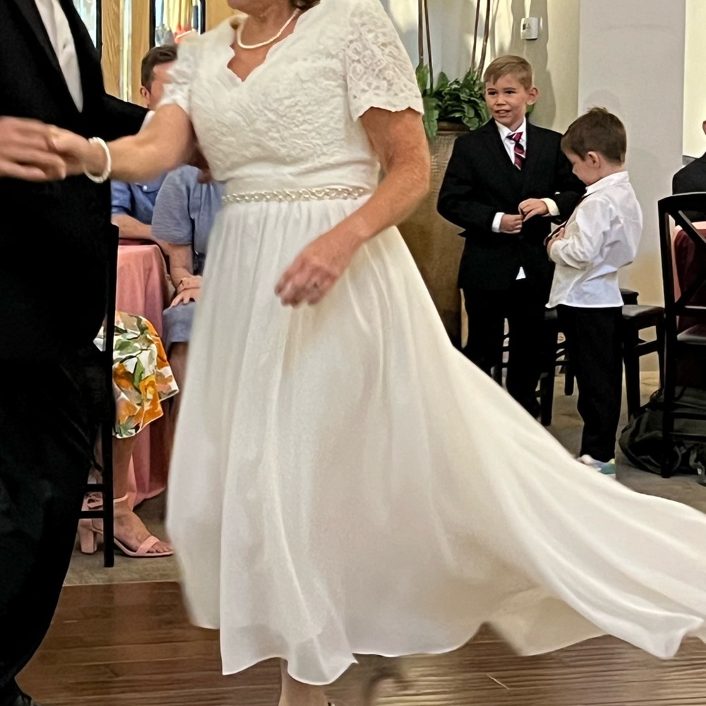 Elegant White Wedding Dress with Pearl Details